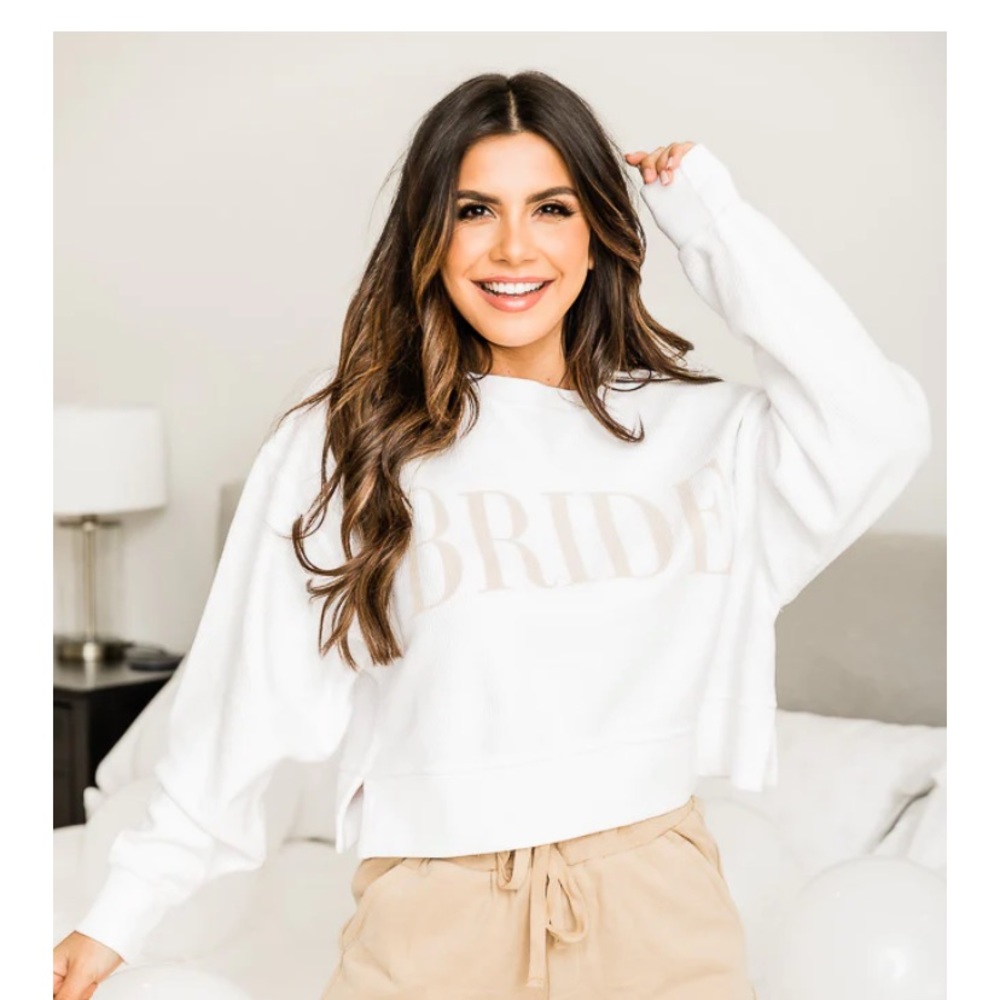 BRIDE VARSITY WHITE CROPPED CORDED GRAPHIC SWEATSHIRT